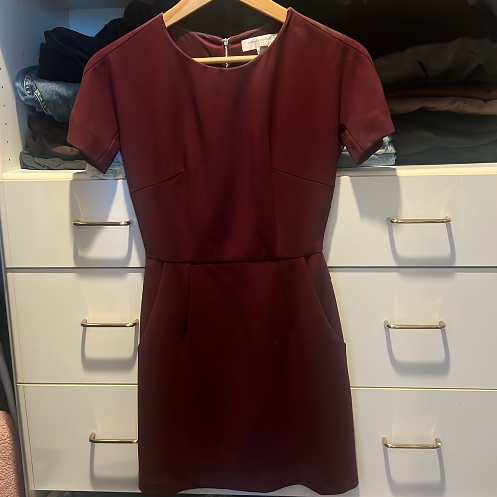 French connection red dress with slight makeup stains at top